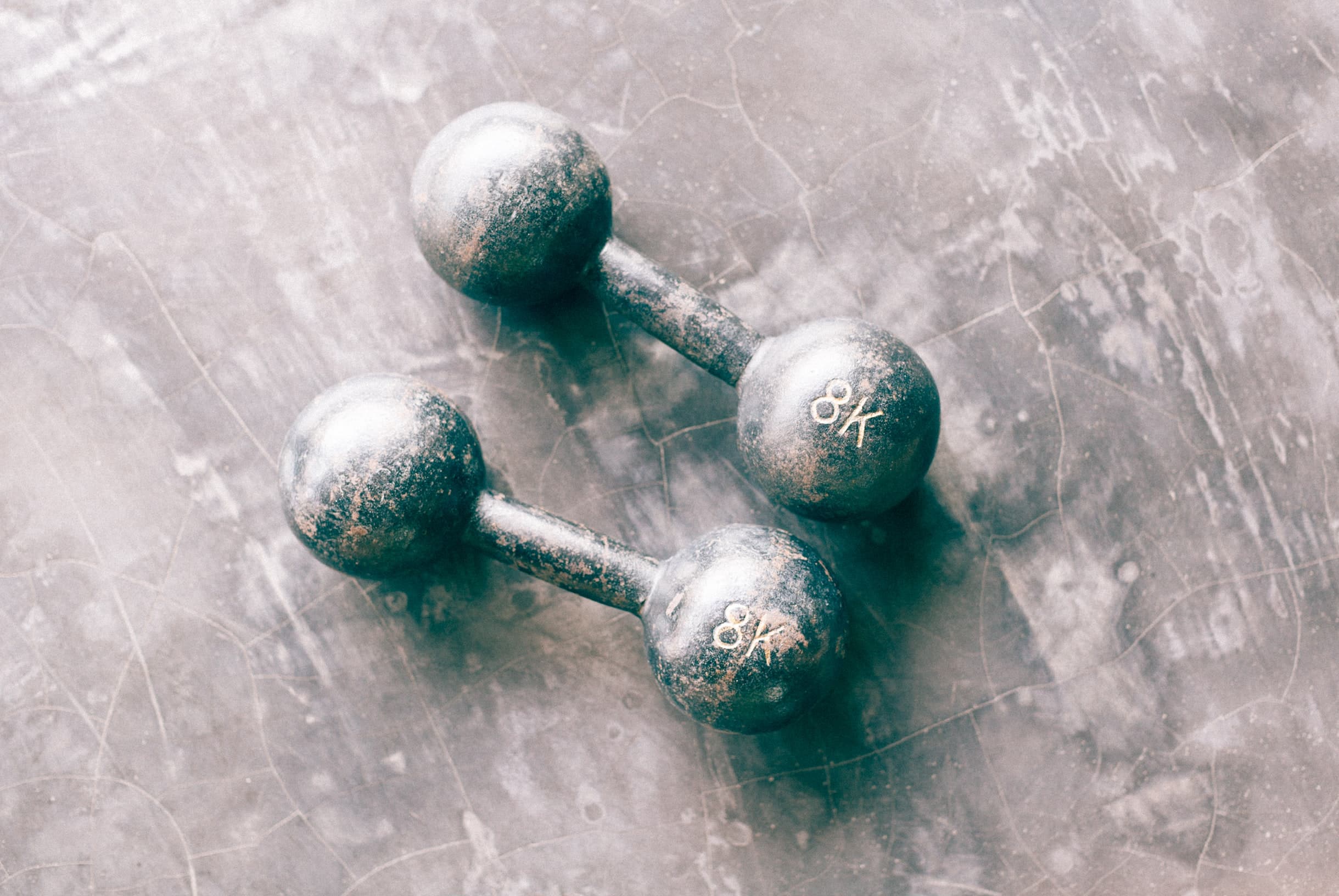 hands pulling a row machine handle